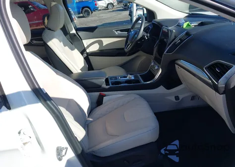 2024 Ford Edge Titanium z USA, uszkodzony, nr VIN 2FMPK4K94RBB09385